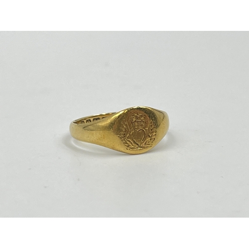 1217 - A George V 18ct gold signet ring, hallmarked Birmingham 1912, size N - approx. gross weight 3.49 gra... 