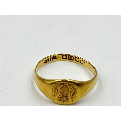 1217 - A George V 18ct gold signet ring, hallmarked Birmingham 1912, size N - approx. gross weight 3.49 gra... 