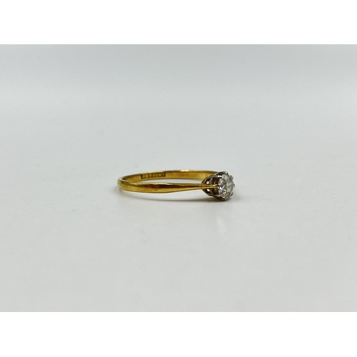 1218 - An 18ct gold and platinum diamond solitaire ring, size P - approx. gross weight 1.7 grams