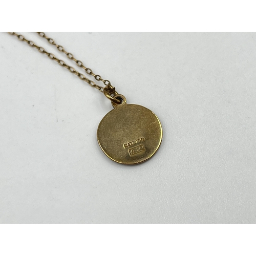 1220 - A yellow metal chain necklace with hallmarked Birmingham 9ct gold St Christopher pendant - approx. g... 