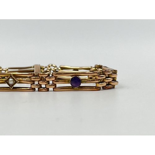 1222 - An antique 9ct gold amethyst and seed pearl gate bracelet - approx. gross weight 8.18 grams and 19cm... 