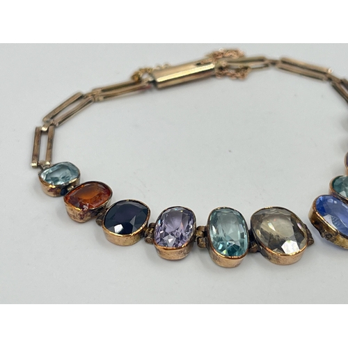 1228 - A Victorian yellow metal multi-gemstone bracelet - approx. gross weight 8.9 grams and 17cm long