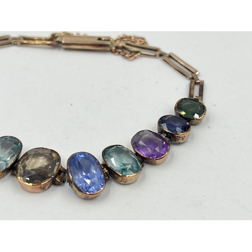 1228 - A Victorian yellow metal multi-gemstone bracelet - approx. gross weight 8.9 grams and 17cm long