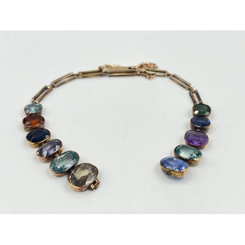 1228 - A Victorian yellow metal multi-gemstone bracelet - approx. gross weight 8.9 grams and 17cm long