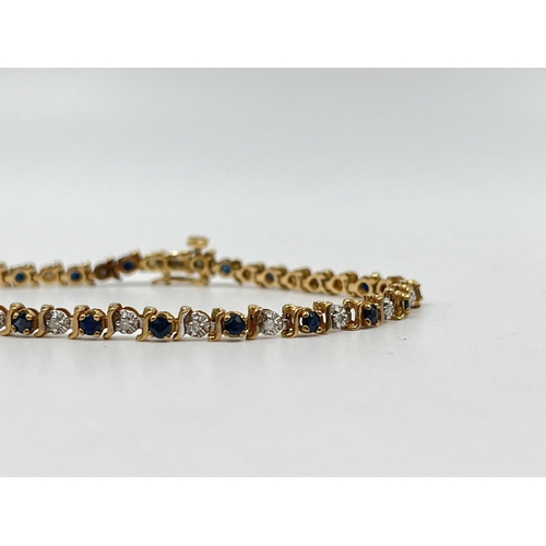 1229 - A hallmarked 9ct gold diamond and sapphire bracelet - approx. gross weight 6.3 grams and 19cm long