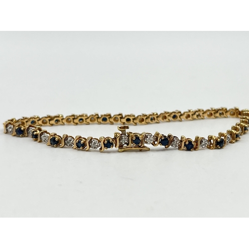 1229 - A hallmarked 9ct gold diamond and sapphire bracelet - approx. gross weight 6.3 grams and 19cm long