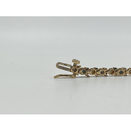 1229 - A hallmarked 9ct gold diamond and sapphire bracelet - approx. gross weight 6.3 grams and 19cm long