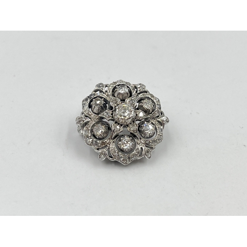 1230 - A Victorian white metal old cut diamond brooch - approx. gross weight 8.32 grams and 2.5cm diameter