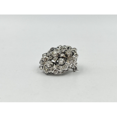 1230 - A Victorian white metal old cut diamond brooch - approx. gross weight 8.32 grams and 2.5cm diameter