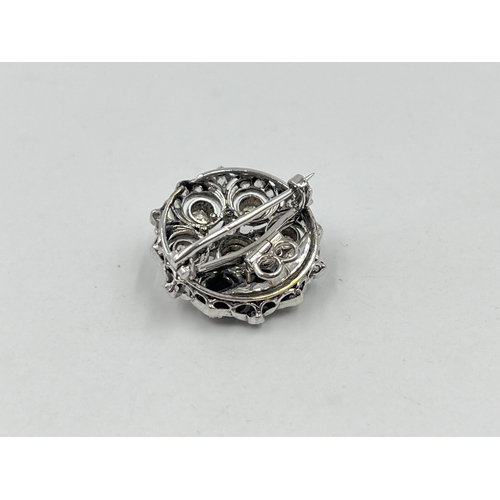 1230 - A Victorian white metal old cut diamond brooch - approx. gross weight 8.32 grams and 2.5cm diameter