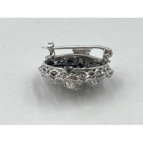 1230 - A Victorian white metal old cut diamond brooch - approx. gross weight 8.32 grams and 2.5cm diameter