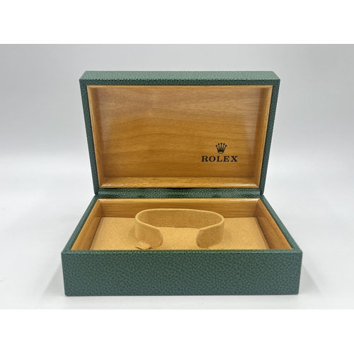 1235 - A Rolex Oyster Perpetual Date Wimbledon presentation box with outer sleeve, paper work and leather w... 