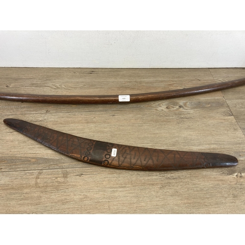 419 - Two pieces of late 19th/early 20th century aboriginal ephemera, carved boomerang and bow