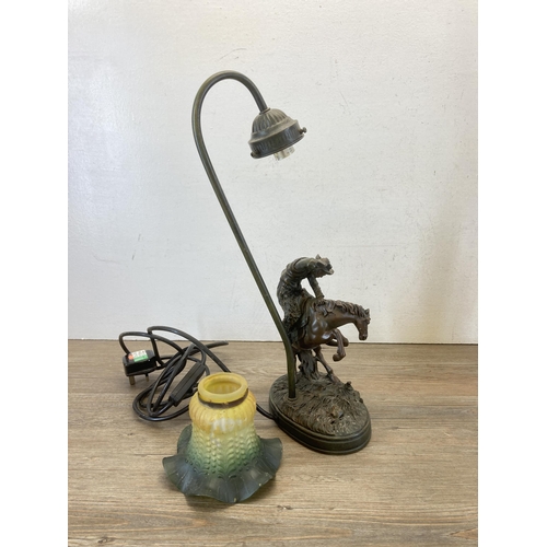 428 - Two bronze effect table lamps, one Tiffany style butterfly and one Widdop Bingham & Co. in the form ... 