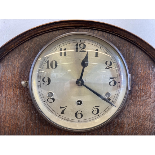 446 - An early/mid 20th century oak cased chiming mantel clock - approx. 28cm high x 36cm wide x 17cm high