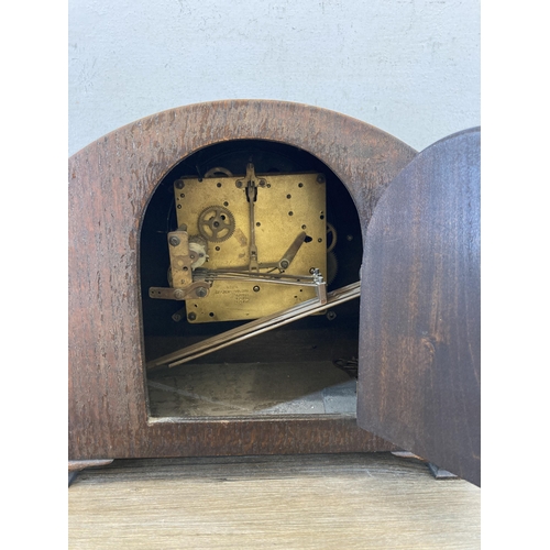 446 - An early/mid 20th century oak cased chiming mantel clock - approx. 28cm high x 36cm wide x 17cm high