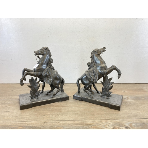 472 - A pair of Guillaume Marly style spelter rearing horse figurines - approx. 27cm high x 23cm long x 12... 