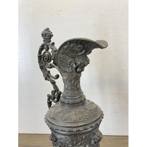 486 - A pair of Neoclassical style spelter ewers - approx. 42cm high