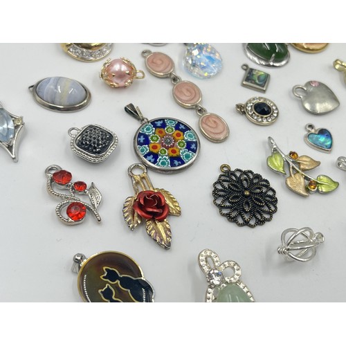 1231C - A collection of pendants