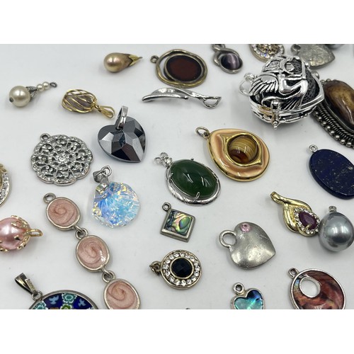 1231C - A collection of pendants