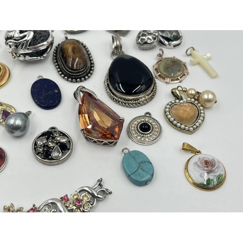 1231C - A collection of pendants