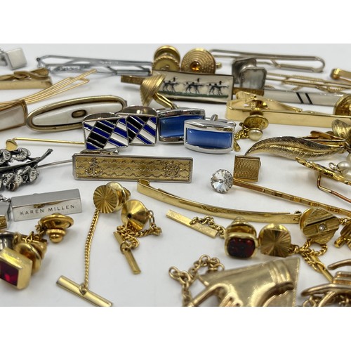 1231D - A collection of tie clips and cufflinks to include Stratton Imitation etc.