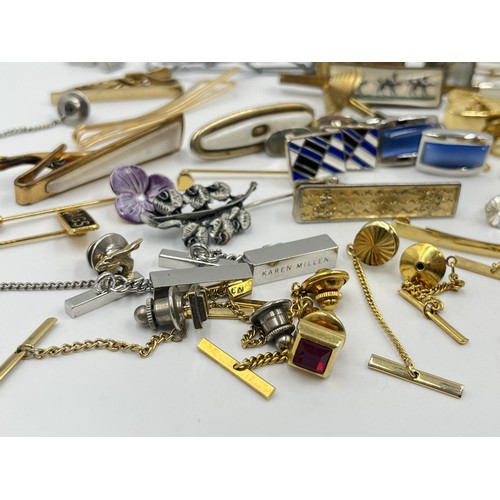 1231D - A collection of tie clips and cufflinks to include Stratton Imitation etc.