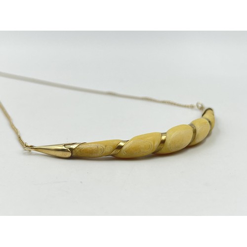 1210A - A Victorian 9ct gold and carved horn pendant necklace - approx. gross weight 6.6 grams