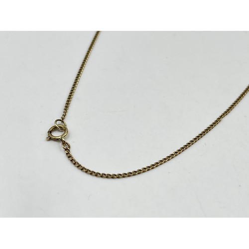 1210A - A Victorian 9ct gold and carved horn pendant necklace - approx. gross weight 6.6 grams