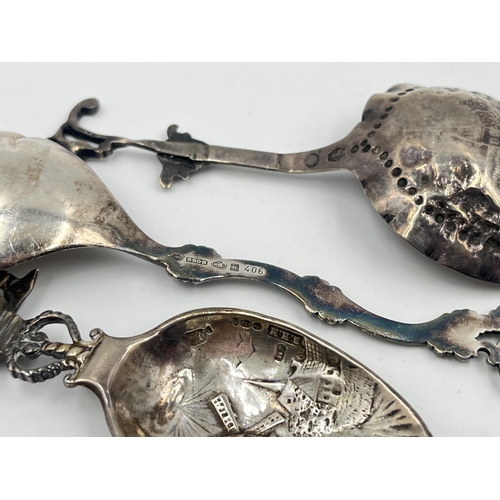 1253 - Three silver collector's spoons, one .925 with windmill and nautical scene, one .830 and one Dutch .... 