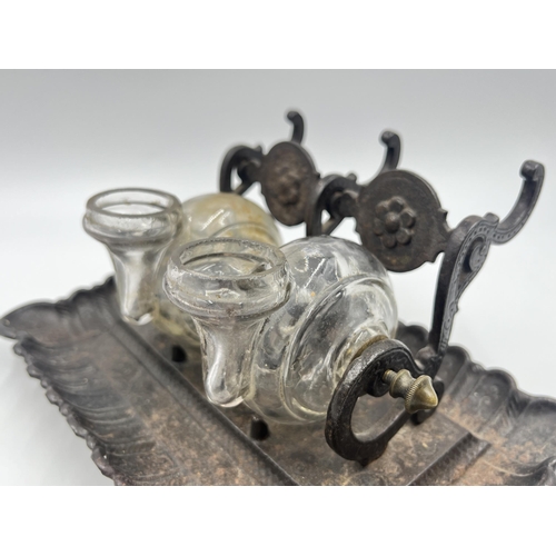 1345 - A 19th century cast iron and glass dual snail inkwell stand - approx. 9.5cm high x 21cm wide x 13.5c... 