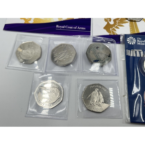 1355 - A collection of British commemorative coins to include The Great British Coin Hunt 2018 UK 10p uncir... 