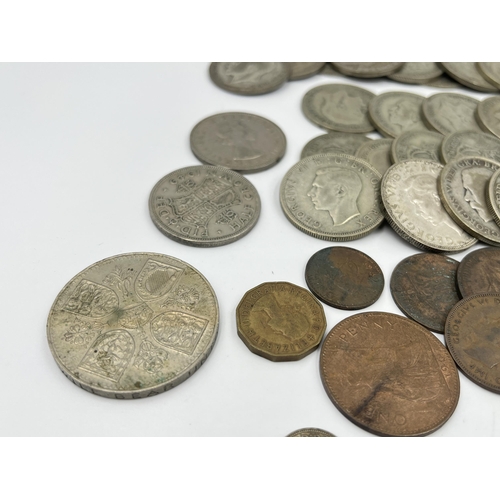 1358 - A collection of coins to include fifty-six 50% silver half crowns - approx. gross weight 774 grams, ... 