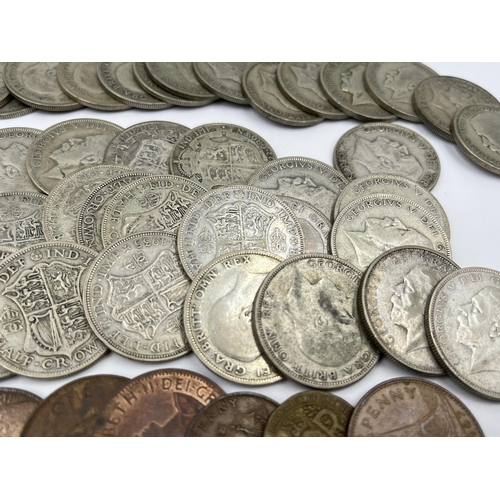 1358 - A collection of coins to include fifty-six 50% silver half crowns - approx. gross weight 774 grams, ... 