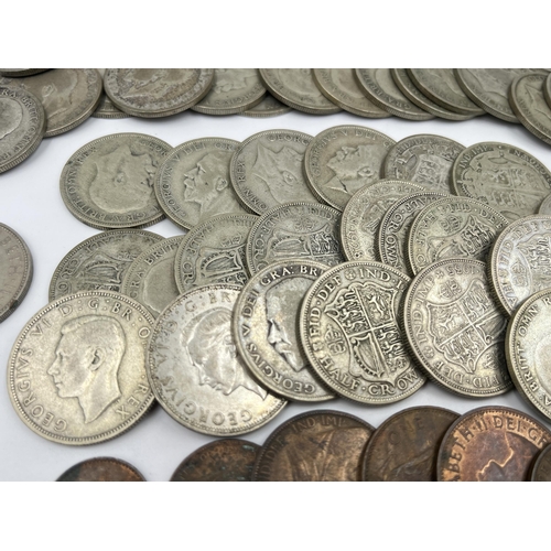 1358 - A collection of coins to include fifty-six 50% silver half crowns - approx. gross weight 774 grams, ... 