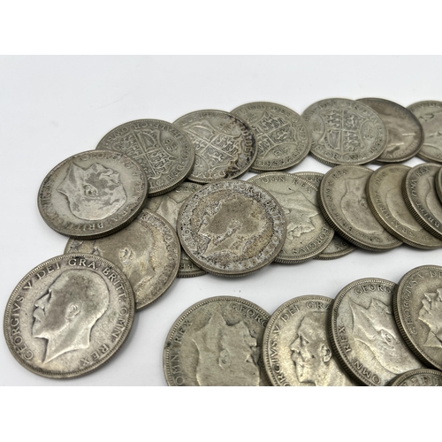 1358 - A collection of coins to include fifty-six 50% silver half crowns - approx. gross weight 774 grams, ... 