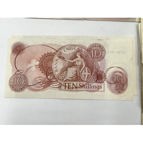 1376 - A collection of approx. eighty-five 1960s Bank of England 10 shilling notes, two with consecutive se... 