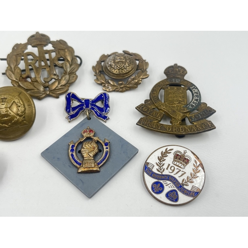 1384 - Eleven vintage badges and buttons to include British Legion, RAF, Royal Army Ordnance Corps, York & ... 