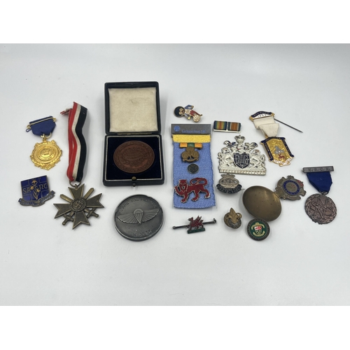 1386 - A collection of medals and badges to include Royal Masonic Institution for Girls, German War Merit C... 