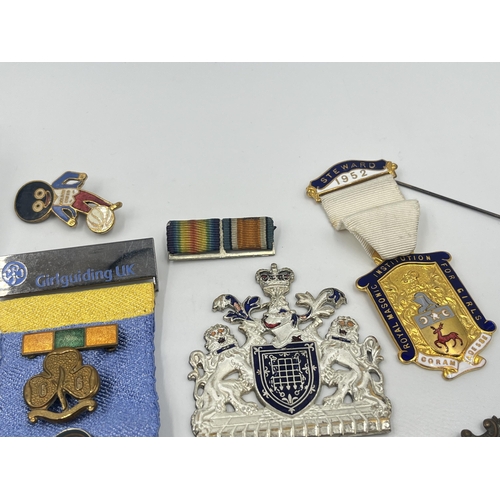 1386 - A collection of medals and badges to include Royal Masonic Institution for Girls, German War Merit C... 