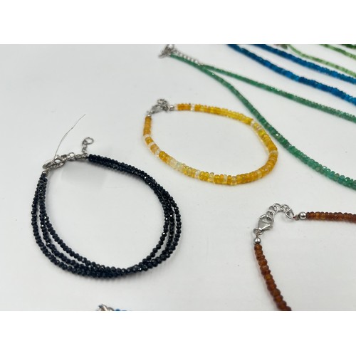 1176 - Eight .925 silver gemstone necklaces and bracelets to include TGGC etc. - approx. gross weight 76 gr... 