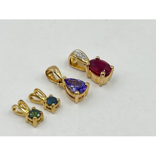 1022 - Four 9ct gold gemstone set pendants, one enhanced blue diamond, one enhanced green diamond, one glas... 