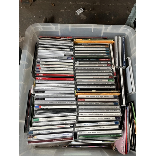 740 - Ten boxes containing a large collection of DVDs, CDs and vinyls