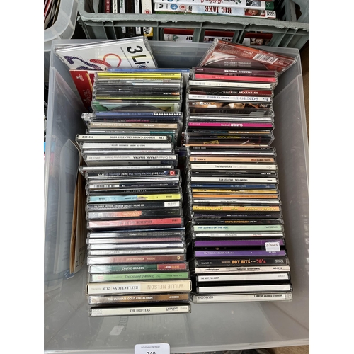 740 - Ten boxes containing a large collection of DVDs, CDs and vinyls