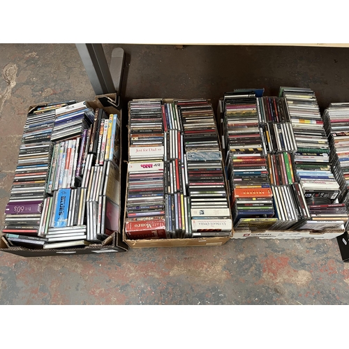 741 - Six boxes containing a large collection of CDs and DVDs