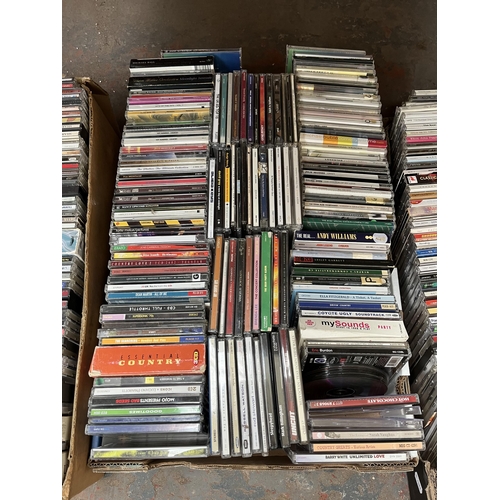 741 - Six boxes containing a large collection of CDs and DVDs