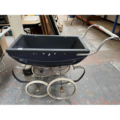 742 - Two mid 20th century Silver Cross style prams to include one containing toys etc.