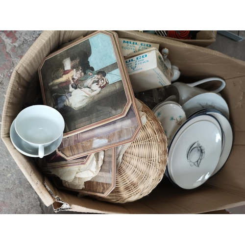 785 - Four boxes and a wicker laundry basket containing cutlery, kitchenware, brassware and ceramics to in... 