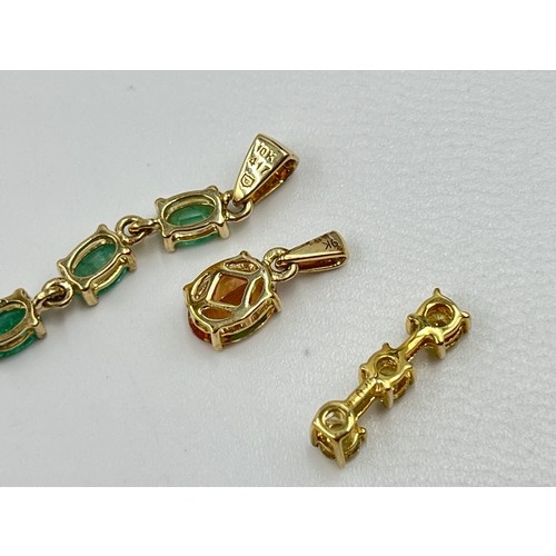 1023 - Three 9ct gold gemstone set pendants, one green beryl, one yellow topaz and one citrine - approx. gr... 