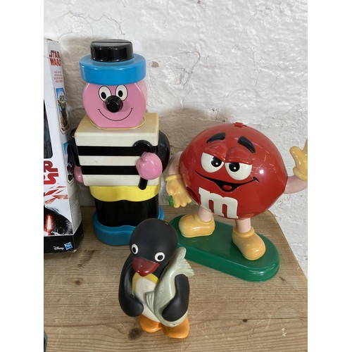 337 - A collection of toys and advertising figurines to include Bassett's Liquorice Allsorts, 1992 Editoy ... 